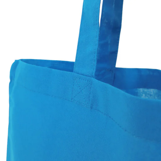 Ljusblå tygkasse med långa axelband