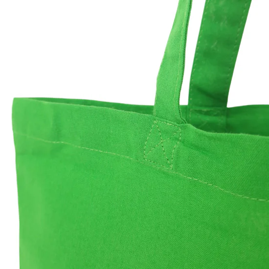 Ljusgrön tygkasse med långa axelband