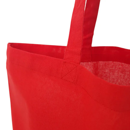 Röd tygkasse med långa axelband